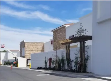 A photo of the back of a shopping center building.