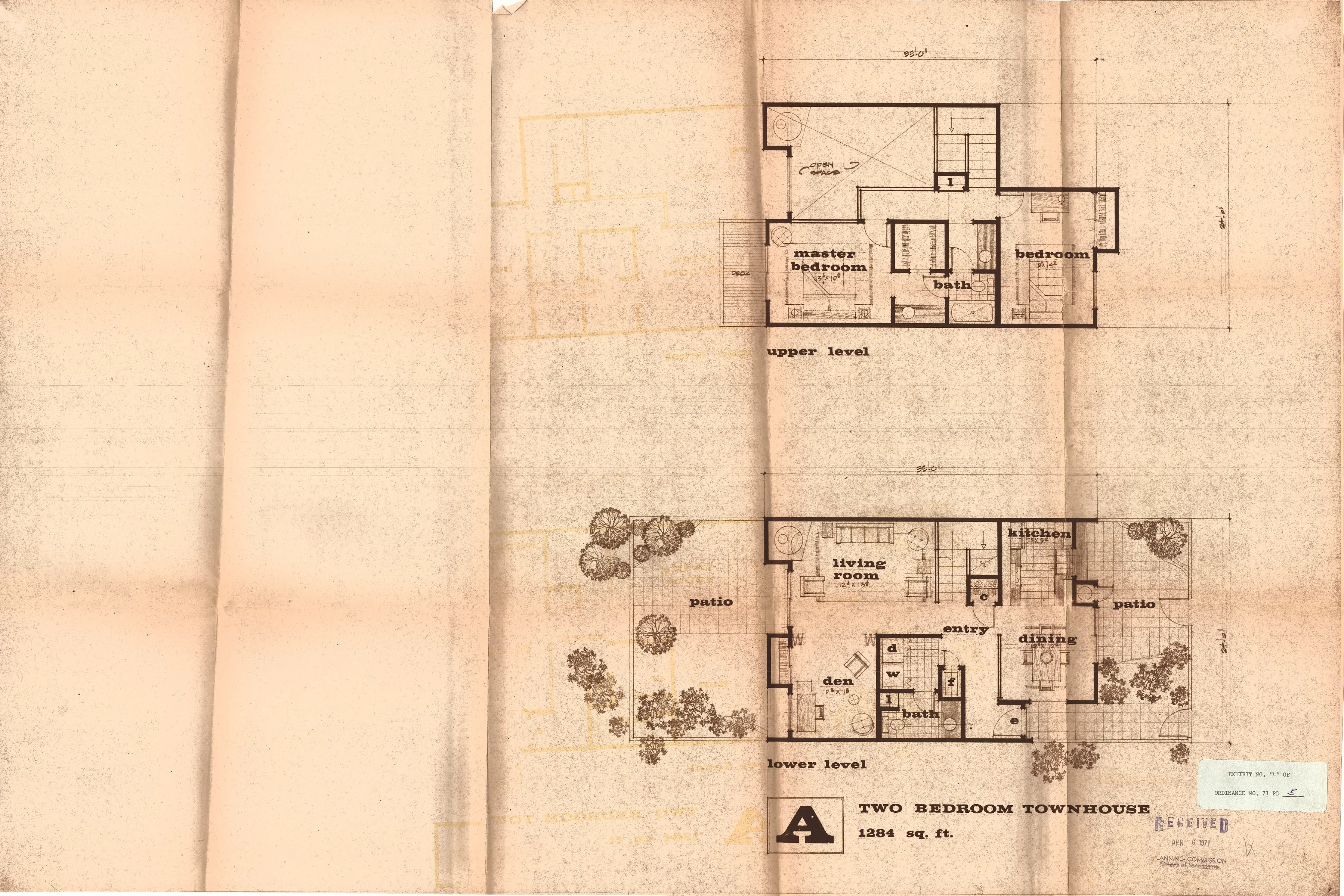 Two-level floor plan of the Type A two-bedroom townhouse (1,284 square feet), showing lower-level living, dining, kitchen, and den, and upper-level bedrooms and baths.