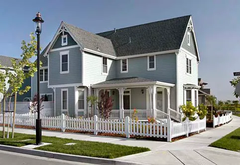 Corner lot house with consistent high-quality details.