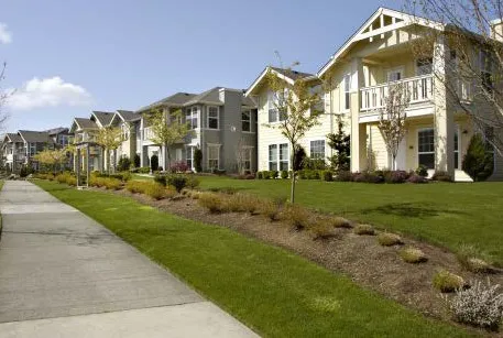 Series of homes with a consistent roof pitch.