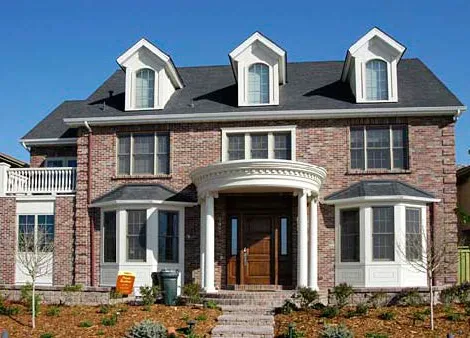 A single-family dwelling with three consistent gable dormers.