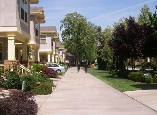 Paseo shown along the frontage of townhomes
