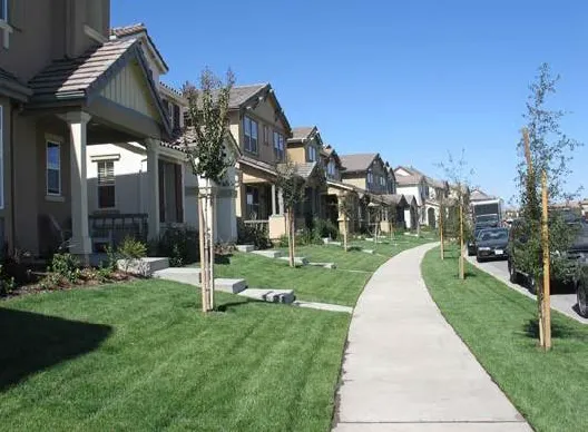 Single family homes with front doors facing the street