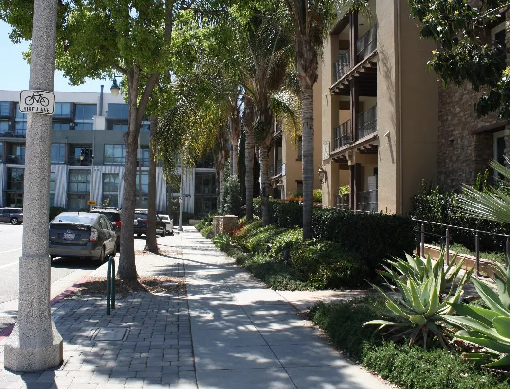 Multifamily building with balconies facing the adjacent street