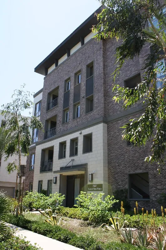 Multifamily building with a variety of complementary facade materials