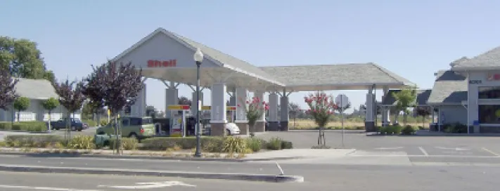 A Shell gas station that has ancillary uses on site.