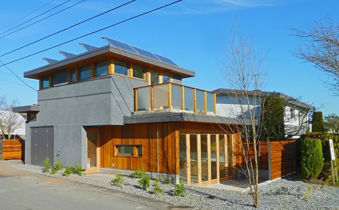 Modern style cargo container home in suburban area.