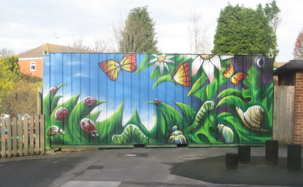 Cargo container painted as a mural within a residential neighborhood