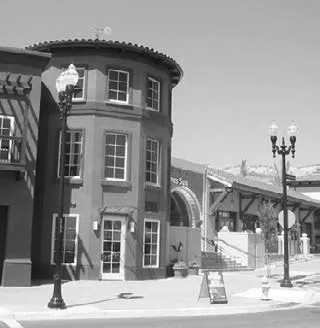 Storefront using street lamp style lighting.