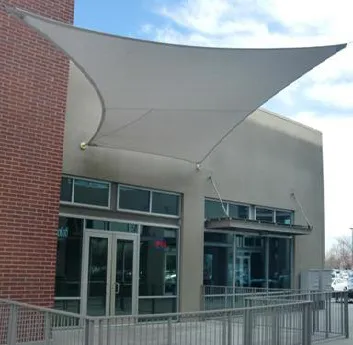 Shade design element incorporated at the entrance of commercial retail building.