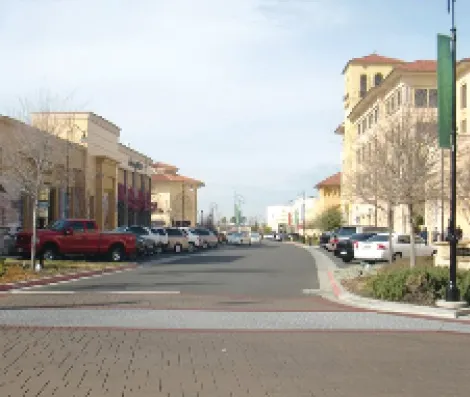 Driveway with angled parking spaces on either side.