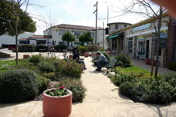 A plaza designed with a seating area rather than a street encouraging pedestrian travel.