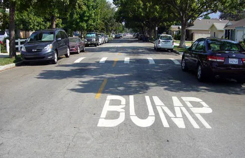 A speed bump in a residential neighborhood.