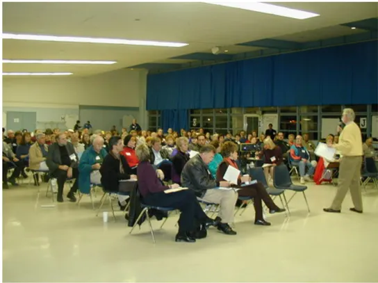 County staff running a community workshop event.
