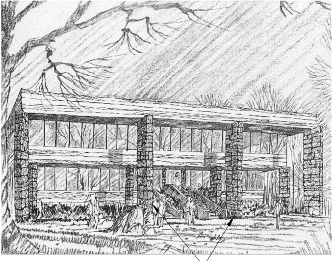 Commercial building with articulate, clearly defined entries as shown by tall brick columns.