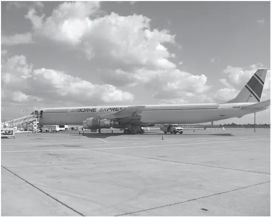 An Airborne Express cargo plane being loaded at the Mather Airport