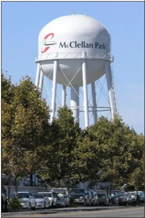 A white water tower that reads "McClellan Park."